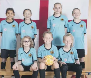  ??  ?? The City of Peterborou­gh Futsal girls squad, who will represent England, are back row, left to right: Aisha Hamza, Holly Plummer, Calleigh Coull, Phoebe Cooper, front row: Evie Roe, Harper Graham and Ava Ballard. Not pictured: Isabel Graham