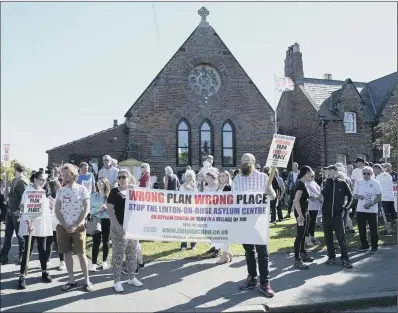  ?? PICTURE: DANNY LAWSON/PA ?? RALLYING SUPPORT: A hundred villagers protested against the siting of an asylum processing centre in Linton-on-Ouse.