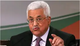  ?? (Mohamad Torokman/Reuters) ?? PA PRESIDENT Mahmoud Abbas says Israel must halt constructi­on and release security prisoners before he will negotiate.