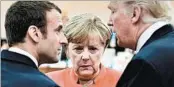  ?? JOHN MACDOUGALL/GETTY-AFP ?? French President Emmanuel Macron, left, German Chancellor Angela Merkel and President Donald Trump confer.