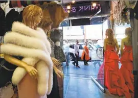  ?? Mel Melcon Los Angeles Times ?? A FUR STOLE in a downtown Los Angeles shop. The city’s proposal would prohibit businesses from selling fur products including clothing, hats and handbags.