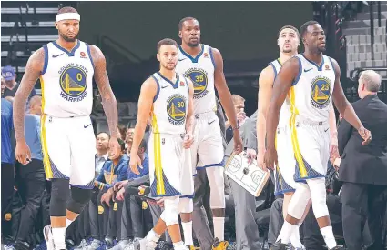  ?? / AILYSNARK.COM ?? ■ CHAMPIONS. Sa pagsugod sa NBA 2018-19 season karong adlawa, usa ang misyon sa laing 29 ka teams -- ang paglumpag sa gingharian sa Golden State Warriors nga pangulohan sa lima ka All-Stars nga sila si (L-R) DeMarcus Cousins, 2-time MVP Stephen Curry, 1-time MVP Kevin Durant, Klay Thompson ug Draymond Green.