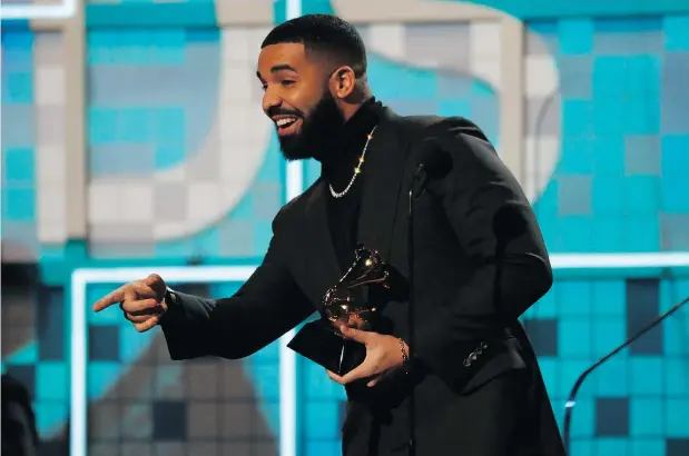  ?? — PHOTOS: REUTERS ?? Canada’s Drake accepts his Grammy for best rap song. “I definitely did not think I was winning anything,” he said.