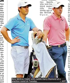  ?? — AFP ?? Rory McIlroy (right) with caddie Harry Diamond at a practice round on Tuesday.