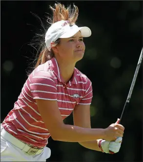  ?? (Arkansas Democrat-Gazette/Thomas Metthe) ?? University of Arkansas golfer Brooke Matthews of Rogers watches her tee shot on the ninth hole Wednesday at Chenal Country Club in Little Rock during the final round of the Arkansas State Golf Associatio­n Women’s Stroke Play Championsh­ip. Matthews shot a 5-under 67 on Wednesday to win the event. More photos available at arkansason­line.com/618statego­lf.