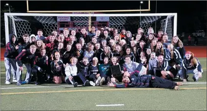  ?? AUSTIN HERTZOG - MEDIANEWS GROUP ?? The Boyertown boys and girls soccer teams pose together after both won their respective PAC championsh­ips on Oct. 17 at Owen J. Roberts.