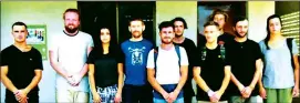  ??  ?? A photo posted by Cambodia’s police of the 10 foreigners detained for ‘producing pornograph­y’