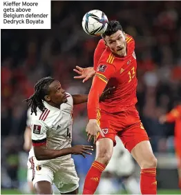  ?? ?? Kieffer Moore gets above Belgium defender Dedryck Boyata