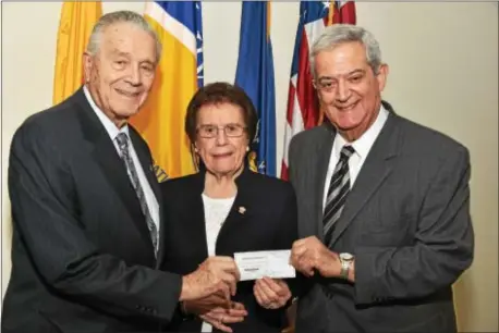  ??  ?? Neumann Radio recently received a $10,000 gift from UNICO Village Foundation. Nicholas F. Quercetti, chairman of the UNICO Village Foundation, and John S. DiGiorgio, Esq., president of the foundation, present Dr. Rosalie Mirenda, Neumann University...