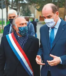  ?? AFP ?? ■ Above: French Prime Minister Jean Castex (right) chats with Olivier Dassault during a visit in Argentine’s district of Beauvais on Friday, his last public appearance.