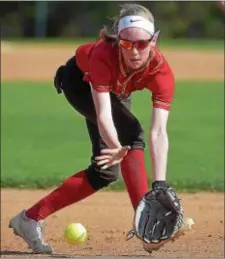  ?? PETE BANNAN — DIGITAL FIRST MEDIA ?? Penncrest shortstop Julia Eckels handles a ground ball against Springfiel­d last week. Eckels hit a two-run home run to help the Lions to a 3-2 victory over Chichester Thursday.