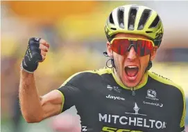  ?? AP PHOTO/ THIBAULT CAMUS ?? British cyclist Simon Yates celebrates as he crosses the finish line to win the 12th stage of the Tour de France on Thursday in Bagneresde-Bigorre.