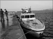  ?? ASSOCIATED PRESS ?? AN ITALIAN BORDER POLICE motorboat is moored at Lampedusa island’s harbor, Italy, after being hit by the Dutchflagg­ed Sea-Watch 3 ship early Saturday.