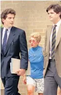  ?? KATHY WILLENS/AP ?? John F. Kennedy Jr., left, left the Palm Beach County Court Nov. 18, 1991 with his cousin William Kennedy Smith, who was on trial for rape. A new Fox News Channel documentar­y looks back on the 10-day trial in West Palm Beach.
