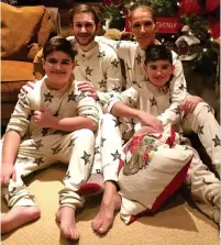  ??  ?? Power of PJs: Celine Dion and her three sons