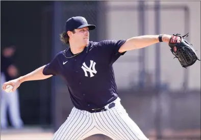  ?? Frank Franklin II / Associated Press ?? The Yankees’ Gerrit Cole delivers a pitch during a spring training workout Monday in Tampa, Fla.