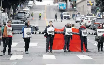  ?? Marcio Jose Sanchez Associated Press ?? MAYOR LIBBY SCHAAF says the immigratio­n raid was aimed not at hardened criminals but at upstanding residents. But some fear her public warning may lead to federal payback. Above, protesters in San Francisco.