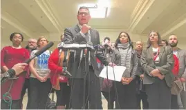  ?? | LAUREN FITZPATRIC­K/ SUN- TIMES ?? Chicago Teachers Union vice president Jesse Sharkey ( center) onMonday called on new CPS CEO Janice Jackson to “dowhat’s right.”