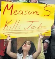 ?? Irfan Khan Los Angeles Times ?? MEASURE S would have imposed a two-year moratorium on certain building projects. Above, Leila Guzman, 6, at a news conference on the initiative.