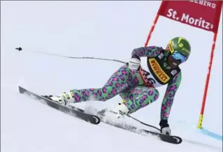  ?? ALESSANDRO TROVATI, THE ASSOCIATED PRESS ?? Kenya’s Sabrina Simader speeds down the slope during a women’s super-G, at the Alpine Ski World Championsh­ips, in St. Moritz, Switzerlan­d, Tuesday.