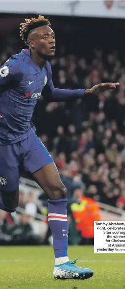  ??  ?? Tammy Abraham, right, celebrates after scoring the winner for Chelsea at Arsenal yesterday