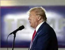  ?? Andrew Harnik/Associated Press ?? Former President Donald Trump speaks at a campaign rally at Terrace View Event Center in Sioux Center, Iowa, Friday. New York state lawyers on Friday increased their request for penalties in Mr. Trump’s civil business fraud trial.