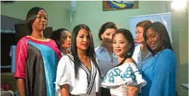 ??  ?? Inmates wearing creations of the brand IntegraArt­e, pose at the Cecilia Orillac de Chiari Women's Rehabilita­tion Centre in Panama City.