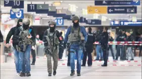  ?? AP ?? Special police forces at the Duesseldor­f train station after the attack, Friday.