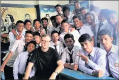  ??  ?? Luke Muggleton started the crowd funding after teaching in Bangladesh. Luke is pictured here with his pupils