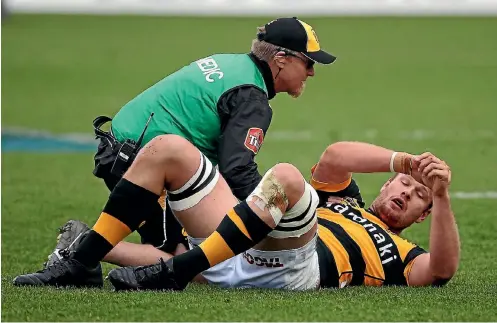  ?? PHOTO: ANDY JACKSON/FAIRFAX NZ ?? James Broadhurst receives medical treatment during a match for Taranaki against Wellington in 2015.