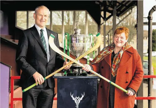  ??  ?? CAMANACHD DRAW: George Fraser, chief executive of Tulloch Homes, and Margaret Davidson, leader of Highland Council, at yesterday’s Camanachd Cup draw