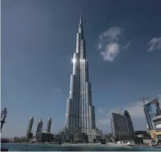 ?? Jeff Topping / The National ?? Burj Khalifa and its surroundin­gs in Dubai is cited an example of well-considered architectu­re