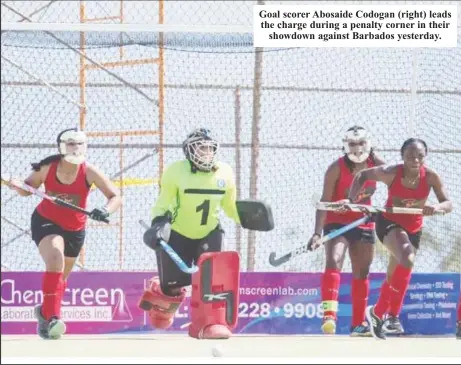  ?? ?? Goal scorer Abosaide Codogan (right) leads the charge during a penalty corner in their showdown against Barbados yesterday.