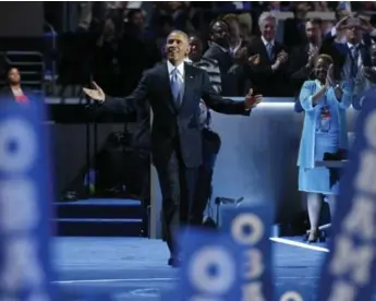  ?? LUCY NICHOLSON/REUTERS ?? U.S. President Barack Obama takes the stage at the Democratic convention in Philadelph­ia on Wednesday.