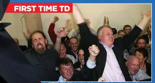  ??  ?? FIRST TIME TD
he’s in: Michael celebrates his by-election victory with Luke ‘Ming’ Flanagan, far left