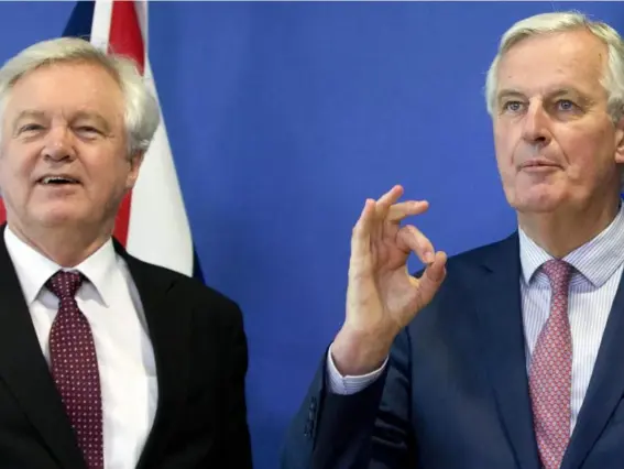  ??  ?? David Davis said the agreement should give the UK ‘confidence’ and Michel Barnier said it was a ‘decisive step’ (AP)