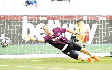  ?? — Reuters photo ?? File photo shows West Ham United’s Joe Hart during the warm up before the English Premier League match against Manchester United at London Stadium.