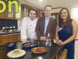  ??  ?? Colombian Amb. Victor Hugo Echeverri presents Annalisa a showcase of Colombia’s cuisine with Chef Alejandro Cuellar