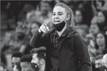  ?? ERIC GAY/AP PHOTO ?? In this Nov. 12, 2021, file photo, San Antonio Spurs assistant coach Becky Hammon directs players during a game against the Dallas Mavericks in San Antonio.