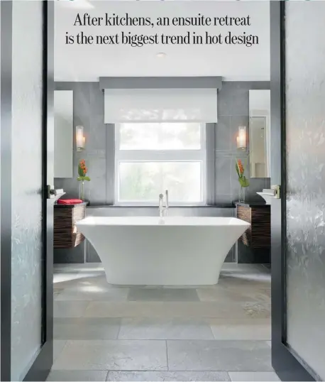  ??  ?? An inviting space: Designed as a contempora­ry spin on a spa-like retreat, this ensuite is anchored by a Victoria + Albert Ravello soaker tub. Other features include a double-door entry, audio system, rain shower and motorized privacy blind.