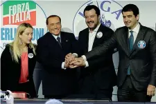  ??  ?? 1 marzo Giorgia Meloni, Silvio Berlusconi, Matteo Salvini e Raffaele Fitto alla vigilia delle Politiche, uniti in coalizione