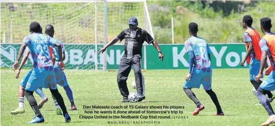  ?? MAHLANGU / BACKPAGEPI­X / SY D N E Y ?? Dan Malesela coach of TS Galaxy shows his players how he wants it done ahead of tomorrow’s trip to Chippa United in the Nedbank Cup frist round.