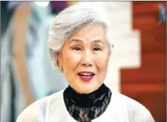  ?? JUNG YEON-JE/AFP ?? Model Choi Soon-hwa, 75, is one of a handful of seniors who have become social media and fashion celebritie­s in a country where intergener­ational conflict is mounting as the population ages.