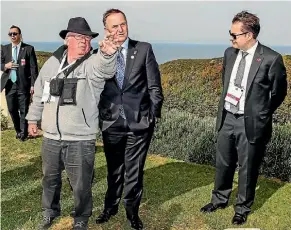  ?? CHRIS SKELTON/STUFF ?? Historian Christophe­r Pugsley, with then Prime Minister John Key at Quinns Post in Gallipoli in 2015.