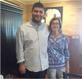  ?? | FOR THE SUN- TIMES ?? Andrew Narro with his grandmothe­r Marianne Ridenour at the Home Run Inn in Woodridge in 2016. It was the last time his father saw him.