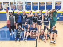  ??  ?? The Shawnee girls basketball team celebrates after a 50-48 win against Altus on Saturday to earn a trip to the Class 5A state tournament. [PHOTO PROVIDED]