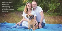  ??  ?? Melissa and Brandon Shollack pose with their dog, Roscoe.