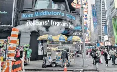  ?? ?? A screen in New York’s Times Square displays the news of Kate’s cancer diagnosis