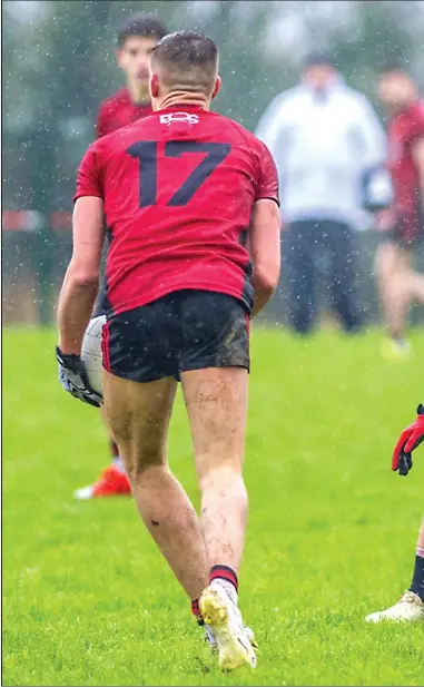  ??  ?? Paddy O’Connor prepares to tackle Pat Havern of Down at Connolly Park. Pics: Tom Callanan.