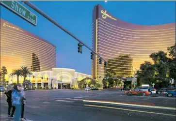  ?? Richard Brian Las Vegas Review-Journal ?? STEVE WYNN’S properties Encore, left, and Wynn Las Vegas, right, on the Vegas Strip. Journalist John L. Smith said Wynn is known as an outsized personalit­y who dominates his properties down to the last detail.